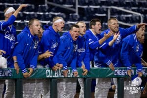 Creighton players in the dugout chirp at the Kansas pitcher after a wild pitch crossed home plate during a college baseball game on Tuesday, May 5, 2026, Omaha, Neb. Photo by Braden Cochran.