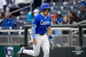 A Creighton Bluejay Ben North (11) celebrates after scoring a run against Kansas during a college baseball game on Tuesday, May 5, 2026, in Omaha, Nebraska. Photo by Braden Cochran.