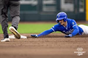 A Creighton Bluejay Rocco Gump (15) slides to second base during a college baseball game against the Kansas Jayhawks on Tuesday, May 5, 2026, in Omaha, Nebraska. Photo by Braden Cochran.