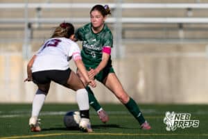 Lincoln Southwest Ansley Throener (9) dribbles the ball against Columbus Lillian Jensen (13) in the second half during a high school soccer match on Wednesday, May 6, 2026, in Lincoln, Neb. Photo by John S. Peterson.