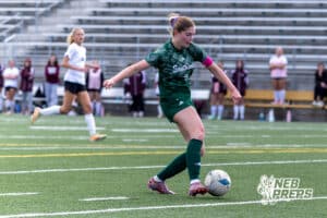 Lincoln Southwest Ansley Throener (9) scores a goal against Columbus in the first half for her third goal for the game breaking the season record for goals during a high school soccer match on Wednesday, May 6, 2026, in Lincoln, Neb. Photo by John S. Peterson.