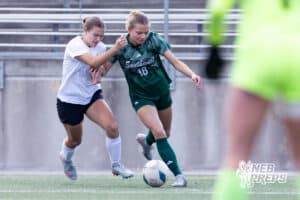 Columbus Karsyn Jaeger (6) defends against Lincoln Southwest Sam Penner (18) in the first half during a high school soccer match on Wednesday, May 6, 2026, in Lincoln, Neb. Photo by John S. Peterson.