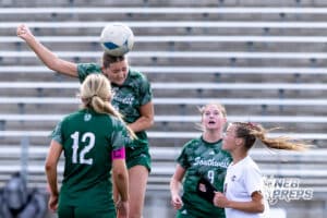 Lincoln Southwest Tea Tweten (19) heads the ball against Columbus in the first half during a high school soccer match on Wednesday, May 6, 2026, in Lincoln, Neb. Photo by John S. Peterson.