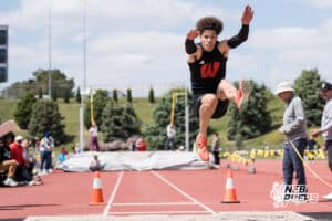 Maurice Purify jumps during the Metro Conference T&F Meet on May 6, 2026, in Omaha, Nebraska. Photo by Brandon Tiedemann.