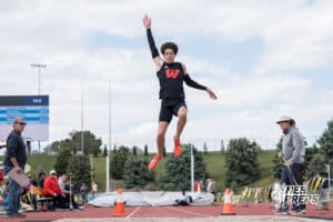 Maurice Purify jumps during the Metro Conference T&F Meet on May 6, 2026, in Omaha, Nebraska. Photo by Brandon Tiedemann.