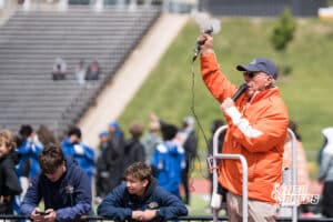 The official shoots his gun to start a race during the Metro Conference T&F Meet on May 6, 2026, in Omaha, Nebraska. Photo by Brandon Tiedemann.