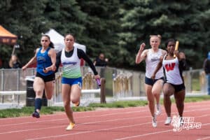 The girls 4x100m partcipants race to the finish line during the Metro Conference T&F Meet on May 6, 2026, in Omaha, Nebraska. Photo by Brandon Tiedemann.