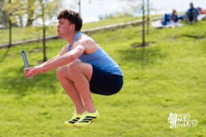 Ethan Laux gets warmed up during the Metro Conference T&F Meet on May 6, 2026, in Omaha, Nebraska. Photo by Brandon Tiedemann.