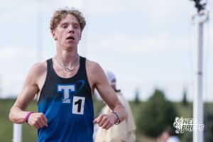 Aidan Gehring crosses the finish line of the boys 1600m during the Metro Conference T&F Meet on May 6, 2026, in Omaha, Nebraska. Photo by Brandon Tiedemann.