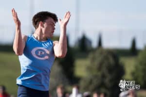 Ethan Laux celebrates winning the 300m boys hurdles during the Metro Conference T&F Meet on May 6, 2026, in Omaha, Nebraska. Photo by Brandon Tiedemann.