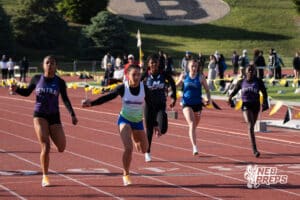 Aaliyah Perry crosses the finish line during the Metro Conference T&F Meet on May 6, 2026, in Omaha, Nebraska. Photo by Brandon Tiedemann.
