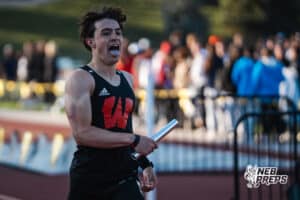 Luke Weiss celebrates after the first heat of the boys 4x400m during the Metro Conference T&F Meet on May 6, 2026, in Omaha, Nebraska. Photo by Brandon Tiedemann.
