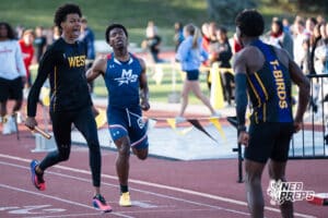 Pierce Parker celebrates winning the boys 4x400m during the Metro Conference T&F Meet on May 6, 2026, in Omaha, Nebraska. Photo by Brandon Tiedemann.
