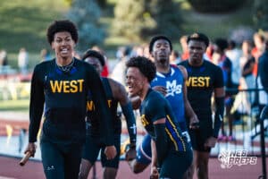 Bellevue West celebrates winning the boys 4x400m during the Metro Conference T&F Meet on May 6, 2026, in Omaha, Nebraska. Photo by Brandon Tiedemann.
