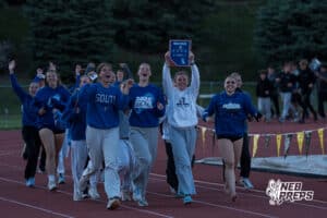 Papillion LaVista South girls do a victory lap during the Metro Conference T&F Meet on May 6, 2026, in Omaha, Nebraska. Photo by Brandon Tiedemann.