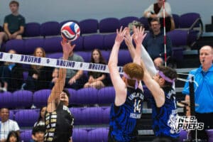 Lincoln South’s Jackson Hollman (14) and Nolan Beutler (1) blocking a volleyball during a Nebraska boys volleyball state championship game against Burke on Sunday, May 3, 2026, in Bellevue, Neb. Photo by Jandi Green.