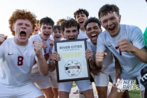 The Roncalli Boys Soccer team is yelling at the camera in celebration after winning the River Cities Conference Championship against South Sioux City on Thursday, April 30, 2026 in South Sioux City, Nebraska. Photo by Jack Stephens.