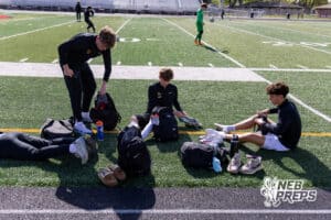 Roncalli’s Asher Hanson (18), Cade Wassenaar (4), and Sebastian Camio (5) are preparing for a high school soccer game against South Sioux City on Thursday, April 30, 2026 in South Sioux City, Nebraska. Photo by Jack Stephens.