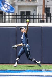 Creighton Bluejay Ella Dalton (13) throws the ball into the infield against the DePaul Blue Demons during a college softball game on Saturday, May 2, 2026, in Omaha, NE. Photo by Jandi Green.