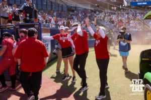 Nebraska Cornhusker head coach Rhonda Revelle waves to all the fans after the loss to the Texas Longhorns during the WCWS elimination game on Sunday, May 31, 2026, in Oklahoma City. Photo by John S. Peterson.