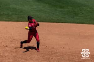 Nebraska Cornhusker infielder Lauren Camenzind (2) throws to first for an out against the Texas Longhorns in the fourth inning during the WCWS elimination game on Sunday, May 31, 2026, in Oklahoma City. Photo by John S. Peterson.