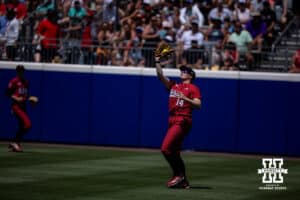 Nebraska Cornhusker outfielder Kacie Hoffmann (14) makes a catch for an out against the Texas Longhorns in the third inning during the WCWS elimination game on Sunday, May 31, 2026, in Oklahoma City. Photo by John S. Peterson.