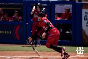 Nebraska Cornhusker Jordy Frahm (98) watches the ball go over the wall for a home run against the Texas Longhorns in the first inning during the WCWS elimination game on Sunday, May 31, 2026, in Oklahoma City. Photo by John S. Peterson.