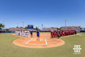 The National Anthem performed before the game between the Nebraska Cornhuskers and the Texas Longhorns during the WCWS elimination game on Sunday, May 31, 2026, in Oklahoma City. Photo by John S. Peterson.