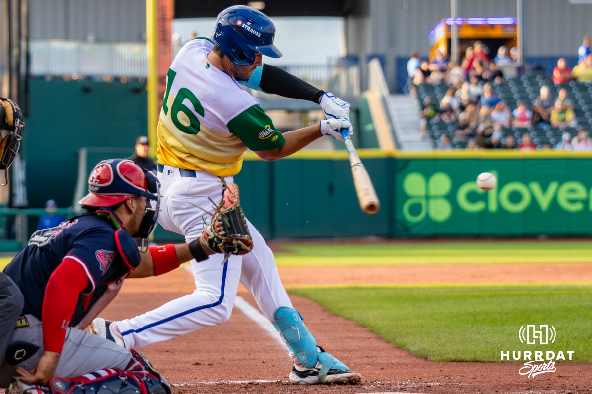 JG20260530_PBSB_OSC_v_MR Omaha Storm Chaser Connor Kaiser (16) hitting a baseball during a minor league baseball game against the Memphis Redbirds on Saturday, May 30, 2026, in Omaha, Neb. Photo by Jandi Green.