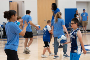A Creighton Bluejay fan dribbles the basketball during their yearly abilities camp on June 5, 2026, in Omaha, Nebraska. Photo by Brandon Tiedemann.