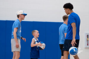 Creighton Bluejay Jasen Green talks to a camper during their yearly abilities camp on June 5, 2026, in Omaha, Nebraska. Photo by Brandon Tiedemann.