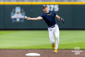 West Virginia Mountaineer 2026 utility Gavin Kelly (2) throws the ball to first during the CWS media day on Thursday, June 11, 2026, in Omaha, Neb. Photo by John S. Peterson.