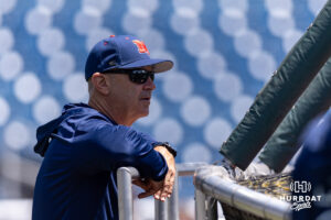 Ole Miss Rebel 2026 head coach Mike Bianco watches batting practice during the CWS media day on Thursday, June 11, 2026, in Omaha, Neb. Photo by John S. Peterson.