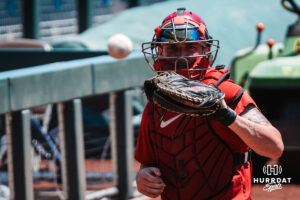 An Alabama player catches balls during the CWS media day on June 11, 2026, in Omaha, Nebraska. Photo by Brandon Tiedemann.