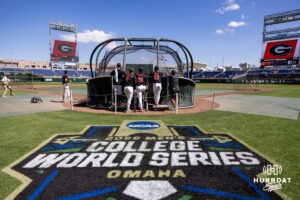Georgia Bulldogs gather around the batting cage for batting practice during the CWS media day on Thursday, June 11, 2026, in Omaha, Neb. Photo by John S. Peterson.