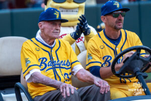 Former Husker head coach Tom Osborne sits during a Banana ball game on June 13, 2026, in Omaha, Nebraska. Photo by Brandon Tiedemann.