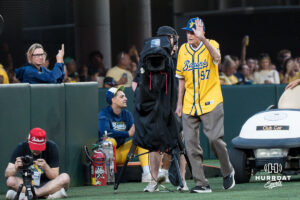 Former Husker head coach Tom Osborne waves to the crowd during a Banana ball game on June 13, 2026, in Omaha, Nebraska. Photo by Brandon Tiedemann.
