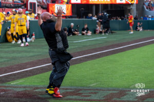 Savannah Banana dancing umpire cheers during a Banana ball game on June 13, 2026, in Omaha, Nebraska. Photo by Brandon Tiedemann.