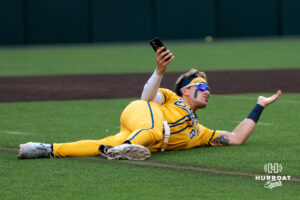 Savannah Banana Jackson Olson (8) lays down during a Banana ball game on June 13, 2026, in Omaha, Nebraska. Photo by Brandon Tiedemann.