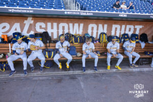 West Virginia Mountaineers players hanging out in the dugout waiting for the start of the game against the North Carolina Tar Heels during the College World Series baseball tournament on Sunday, June 14, 2026, in Omaha, Neb. Photo by John S. Peterson.