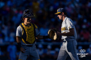 West Virginia Mountaineer 2026 pitcher Maxx Yehl (15) heads to the dugout after the second inning against the North Carolina Tar Heels during the College World Series baseball tournament on Sunday, June 14, 2026, in Omaha, Neb. Photo by John S. Peterson.