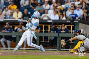 North Carolina Tar Heel Carter French (18) singles in the fourth inning during the College World Series baseball tournament on Sunday, June 14, 2026, in Omaha, Neb. Photo by John S. Peterson.