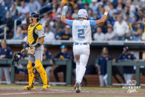 North Carolina Tar Heel 2026 infielder Jake Schaffner (2) scores a run against the West Virginia Mountaineers in the seventh inning during the College World Series baseball tournament on Sunday, June 14, 2026, in Omaha, Neb. Photo by John S. Peterson.