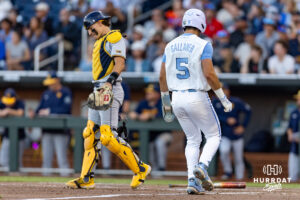 North Carolina Tar Heel 2026 infielder Gavin Gallaher (5) scores a run against the West Virginia Mountaineers in the seventh during the College World Series baseball tournament on Sunday, June 14, 2026, in Omaha, Neb. Photo by John S. Peterson.