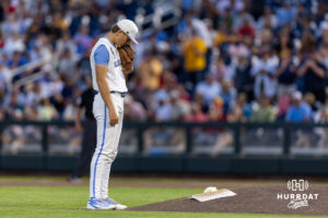 North Carolina Tar Heel pitcher Caden Glauber (27) prepares to pitch against the West Virginia Mountaineers in the ninth inning during the College World Series baseball tournament on Sunday, June 14, 2026, in Omaha, Neb. Photo by John S. Peterson.