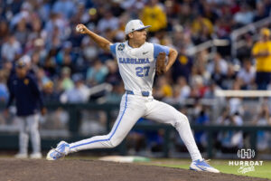 North Carolina Tar Heel 2026 pitcher Caden Glauber (27) throws a pitch agianst the West Virginia Mountaineers in the ninth inning during the College World Series baseball tournament on Sunday, June 14, 2026, in Omaha, Neb. Photo by John S. Peterson.