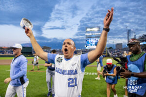North Carolina Tar Heel 2026 head coach Scott Forbes celebrates the win over the West Virginia Mountaineers during the College World Series baseball tournament on Sunday, June 14, 2026, in Omaha, Neb. Photo by John S. Peterson.