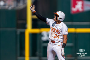 Texas Longhorns Adrian Rodriguez (24) celebrates a double during a CWS game on June 15, 2026, in Omaha, Nebraska. Photo by Brandon Tiedemann.