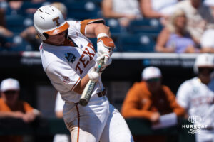 Texas Longhorns Carson Tinney (8) hits the ball during a CWS game on June 15, 2026, in Omaha, Nebraska. Photo by Brandon Tiedemann.
