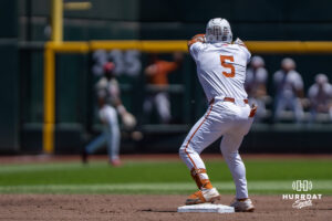 Texas Longhorn Ethan Mendoza (5) celebrates a double during a CWS game on June 15, 2026, in Omaha, Nebraska. Photo by Brandon Tiedemann.